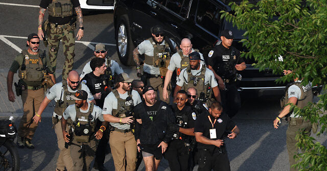 UFC Fighter Sean Strickland Escorted Out of UFC Fan Fest Event